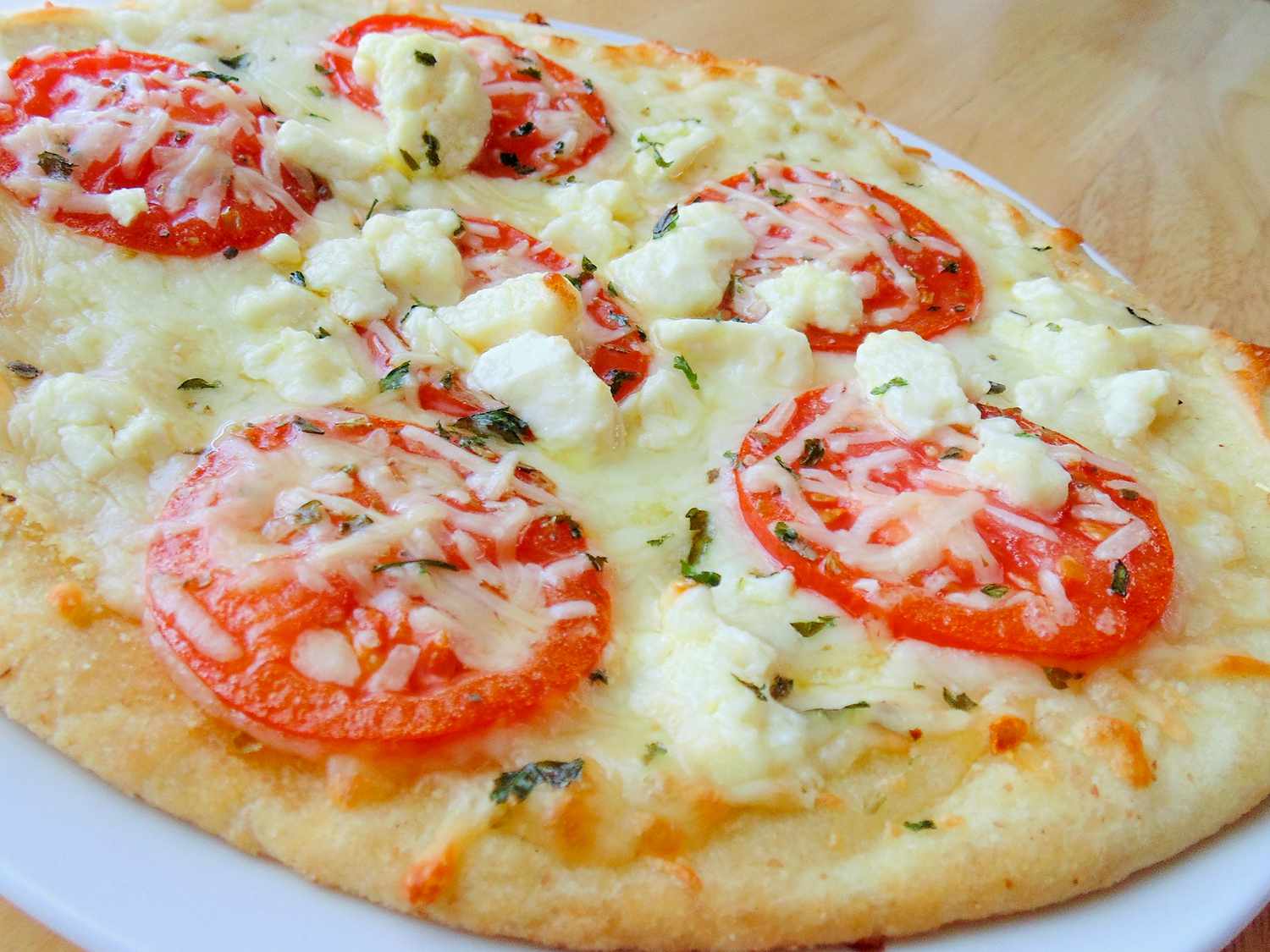 Wood-fired Margherita pizza with fresh basil