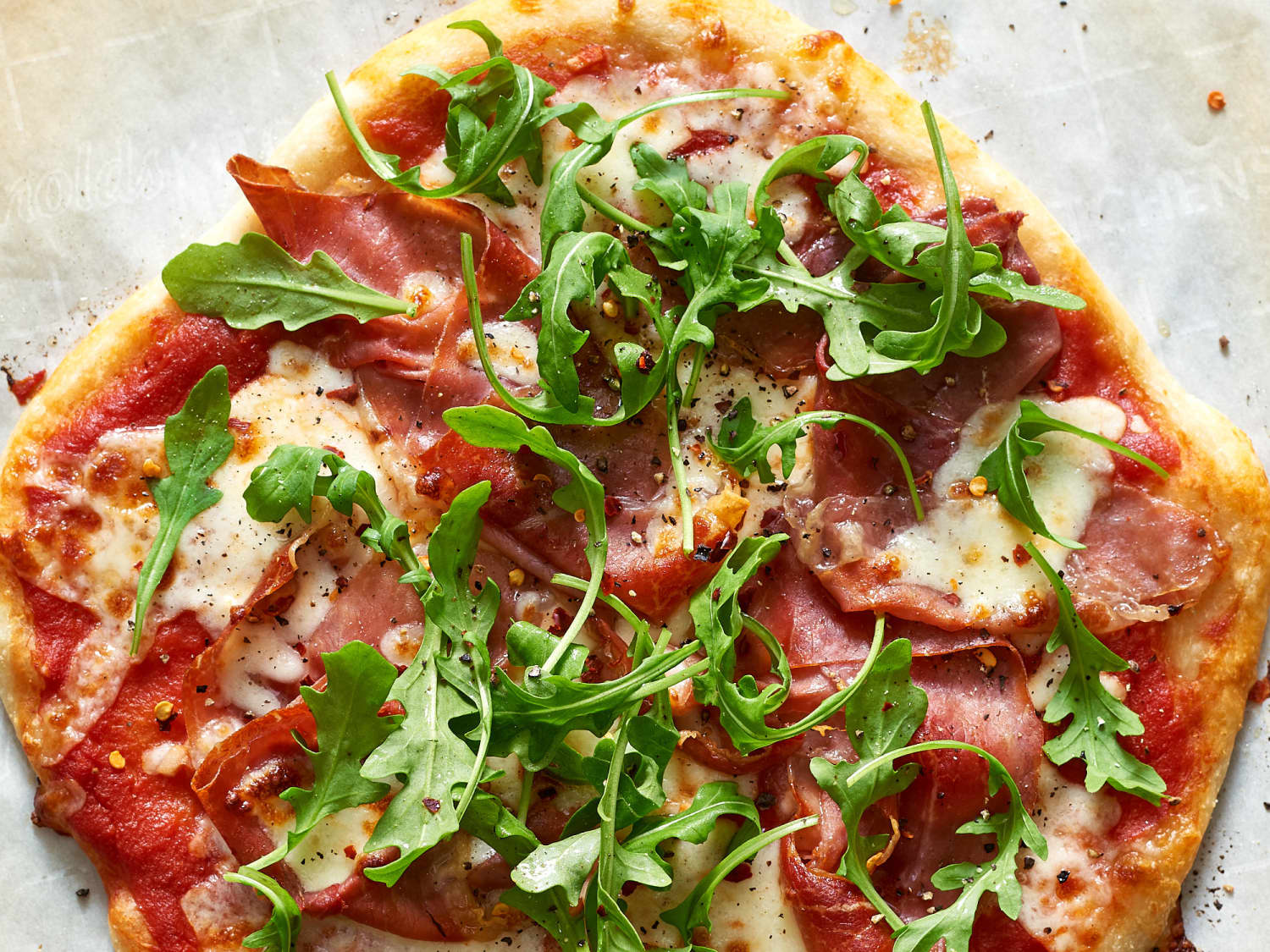 Prosciutto pizza with rocket